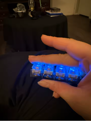 Customer photo: Nooda LEDs glowing blue in a dark room